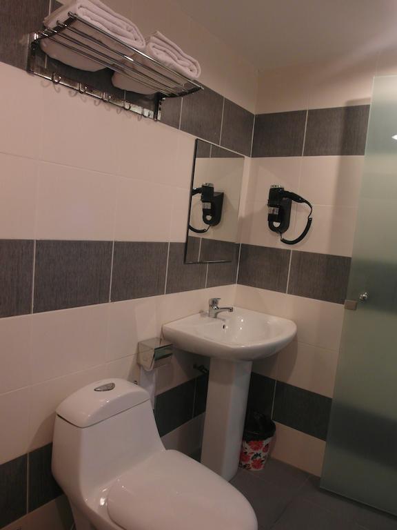 Mcity Inn Miri Værelse billede