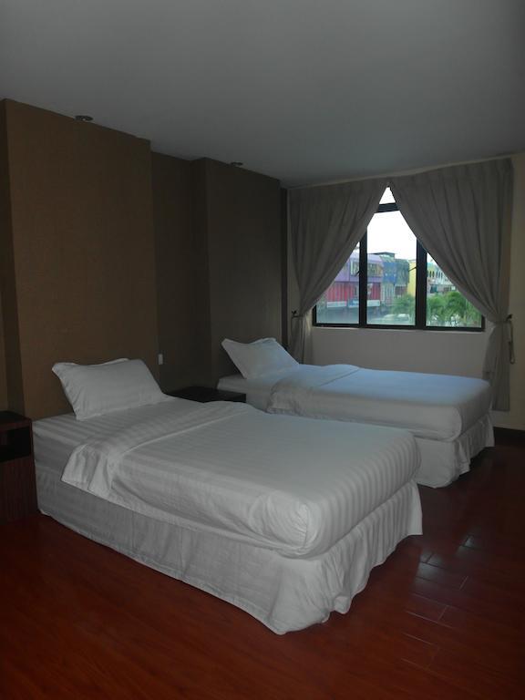Mcity Inn Miri Værelse billede