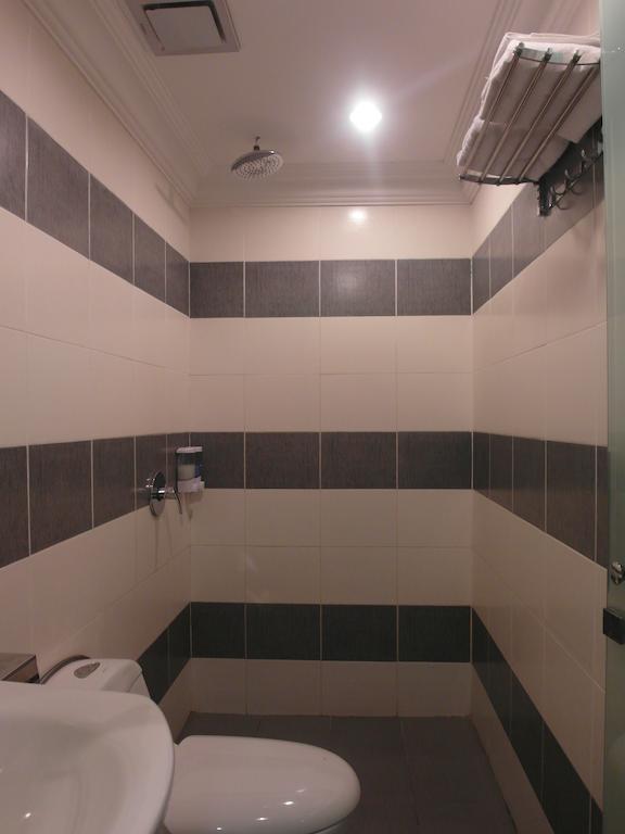 Mcity Inn Miri Værelse billede