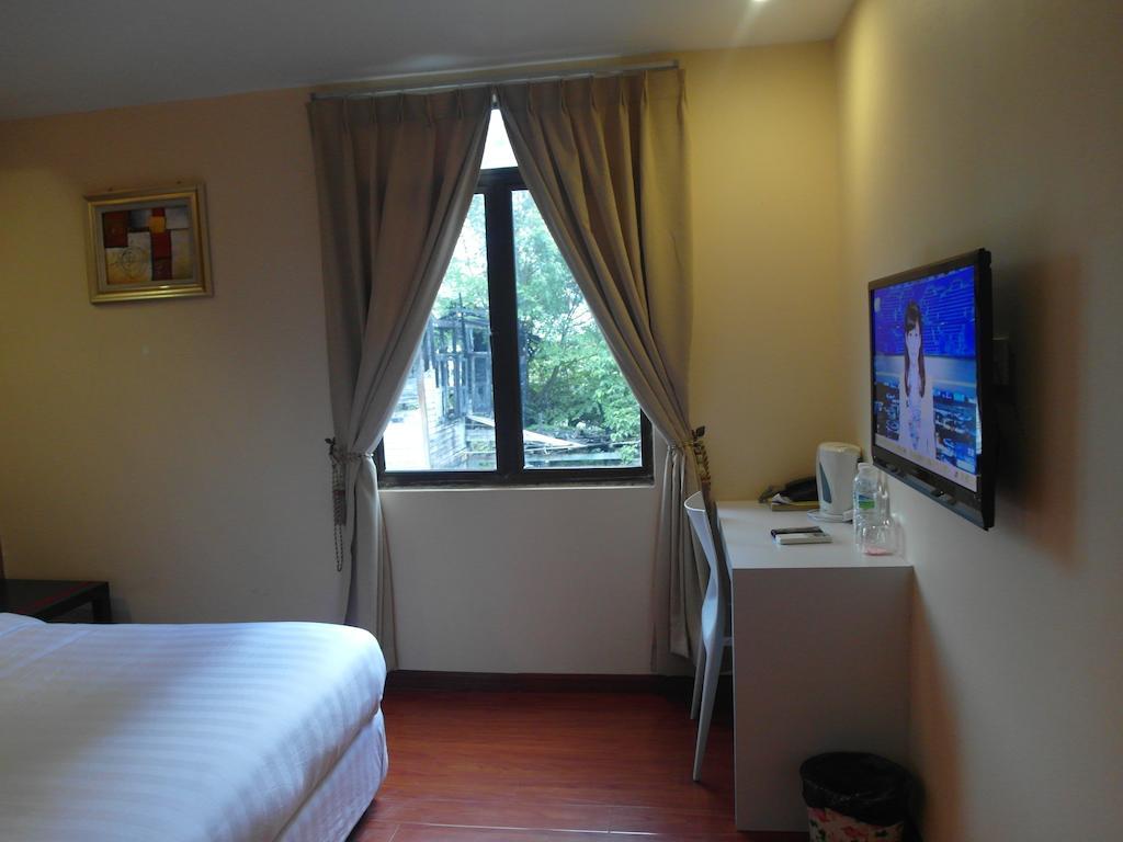 Mcity Inn Miri Værelse billede